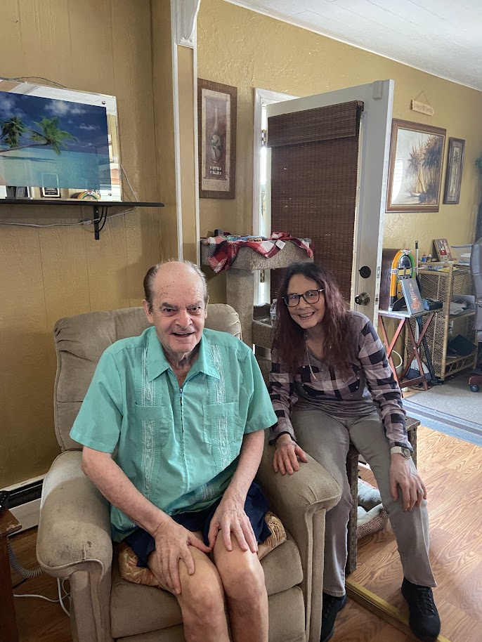 Dick Stoddard with his caregiver Susan